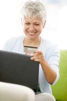 A woman buying something online with her credit card